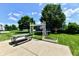 Backyard with a patio, table, pergola, garden feature, and a trampoline at 10539 Ross Xing, Fishers, IN 46038