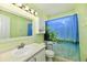 Bathroom with a decorative mirror, decorative shower curtain and a light-colored accent wall at 10539 Ross Xing, Fishers, IN 46038