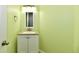 Bathroom featuring a vanity with new hardware, decorative mirror, and neutral countertop at 10539 Ross Xing, Fishers, IN 46038