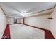 Large basement featuring carpet, white walls, updated lighting, and doorways to other rooms at 11 N Restin Rd, Greenwood, IN 46142