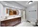 Bathroom features a large vanity, framed mirror, and glass shower at 11 N Restin Rd, Greenwood, IN 46142