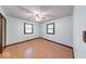 Spacious bedroom with light walls, wood-look flooring and natural light at 11 N Restin Rd, Greenwood, IN 46142