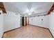 Open bedroom featuring wood-look floors and ample closet space at 11 N Restin Rd, Greenwood, IN 46142