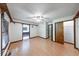 Large bedroom with wood-look floors and access to a connected bathroom at 11 N Restin Rd, Greenwood, IN 46142