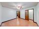 Bright bedroom featuring neutral decor, a ceiling fan and closet at 11 N Restin Rd, Greenwood, IN 46142