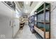 A workshop offers ample storage shelving and a work bench for hobbies or projects at 11 N Restin Rd, Greenwood, IN 46142