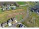 View of a large lot surrounded by well-maintained lawns and tree lined streets at 1130 Constitution Dr, Edinburgh, IN 46124