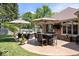 Outdoor patio with furniture set, dining area under umbrella, and grill perfect for entertaining Gathering and friends at 12674 Banbury Cir, Carmel, IN 46033