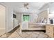 Bright bedroom with light-colored walls, plush rug, and a decorative headboard at 12674 Banbury Cir, Carmel, IN 46033