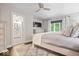 Bright bedroom with view to ensuite bathroom and view to the backyard at 12674 Banbury Cir, Carmel, IN 46033