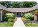 Inviting front entrance with a well-manicured landscape leading to a stylish front door at 12674 Banbury Cir, Carmel, IN 46033