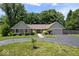 Ranch home featuring professional landscaping, manicured lawn and attached two-car garage at 12674 Banbury Cir, Carmel, IN 46033