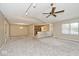 Bright and open living area with seamless flow from living room to kitchen, enhanced by natural light at 13 Marywood Dr, Greenfield, IN 46140