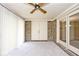 Enclosed patio with brick accents and sliding glass doors, providing a versatile living space at 13 Marywood Dr, Greenfield, IN 46140