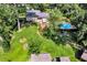 Aerial view of property with a private backyard featuring a swimming pool and well-maintained landscaping at 1340 Eustis Dr, Indianapolis, IN 46229