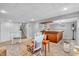 Spacious finished basement with a bar, seating area, and ample lighting at 1340 Eustis Dr, Indianapolis, IN 46229