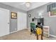 Office features include built-in storage, neutral walls and carpeted floors at 1340 Eustis Dr, Indianapolis, IN 46229