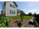 Backyard featuring a well maintained lawn, mature trees, and patio with outdoor seating at 15813 Arthur Jacob Ln, Noblesville, IN 46060