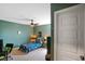 Neutrally painted bedroom featuring a ceiling fan and a cozy single bed with matching decor at 15813 Arthur Jacob Ln, Noblesville, IN 46060