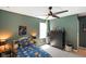 Space themed bedroom with dark green walls, space bedding, and a large dresser at 15813 Arthur Jacob Ln, Noblesville, IN 46060