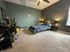 Bedroom with galaxy-themed bed, ceiling fan, and desk area, perfect for any  at 15813 Arthur Jacob Ln, Noblesville, IN 46060