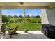 Peaceful outdoor living space with a large lawn view and ceiling fan at 15813 Arthur Jacob Ln, Noblesville, IN 46060