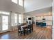 Open concept: Dining room seamlessly flows into the kitchen and living area for easy entertaining at 15813 Arthur Jacob Ln, Noblesville, IN 46060
