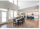 Dining room overlooking an open concept living room and kitchen at 15813 Arthur Jacob Ln, Noblesville, IN 46060