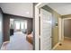 Stylish interior hallway leads to a living space with plush seating and lots of light at 15813 Arthur Jacob Ln, Noblesville, IN 46060
