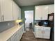 Bright kitchen with white cabinets, quartz countertops, subway tile backsplash, and stainless appliances at 15813 Arthur Jacob Ln, Noblesville, IN 46060