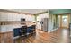 Eat-in kitchen with a large island, stainless steel appliances, and modern white cabinets at 15813 Arthur Jacob Ln, Noblesville, IN 46060