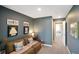 Cozy living room with a plush sofa and lots of natural light at 15813 Arthur Jacob Ln, Noblesville, IN 46060