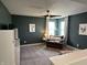 Sitting room featuring a soft chair and bright natural light, with views from the landing at 15813 Arthur Jacob Ln, Noblesville, IN 46060