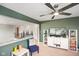 Comfortable living room featuring a ceiling fan and views of the loft area beyond at 15813 Arthur Jacob Ln, Noblesville, IN 46060