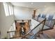 Expansive open-concept space showcasing modern design and wood floors from a second story vantage point at 15813 Arthur Jacob Ln, Noblesville, IN 46060