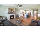 Open-concept living space with fireplace and seamless access to the modern kitchen at 15813 Arthur Jacob Ln, Noblesville, IN 46060