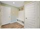 Functional mudroom provides ample storage with a built-in bench, cubbies, and multiple access points to the house at 15813 Arthur Jacob Ln, Noblesville, IN 46060