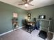 Home office features modern furnishings, neutral paint, and carpeting at 15813 Arthur Jacob Ln, Noblesville, IN 46060