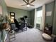 Home office features a treadmill, desk, neutral paint, and carpeting at 15813 Arthur Jacob Ln, Noblesville, IN 46060
