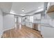 Modern kitchen featuring white cabinets, granite countertops, and stainless steel appliances at 1641 Deloss St, Indianapolis, IN 46201