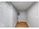 Bright laundry room with wood floors and dryer vent at 1641 Deloss St, Indianapolis, IN 46201