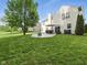 Spacious backyard with well-maintained lawn, patio and grilling area at 1680 Woodfield Dr, Greenwood, IN 46143