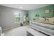 Bedroom featuring a built in wall storage unit, and view to the backyard at 1680 Woodfield Dr, Greenwood, IN 46143