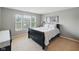 Cozy bedroom with large windows allowing natural light at 1680 Woodfield Dr, Greenwood, IN 46143