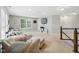 Comfortable living room with sectional sofa and stairs leading to another level at 1680 Woodfield Dr, Greenwood, IN 46143