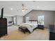 Spacious main bedroom with vaulted ceilings, a ceiling fan, and plenty of natural light at 1680 Woodfield Dr, Greenwood, IN 46143