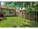 Green backyard with a privacy fence at 17401 Austrian Pine Way, Westfield, IN 46074