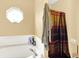 Bright bathroom with a tiled shower-tub combination and an octagon window at 17401 Austrian Pine Way, Westfield, IN 46074