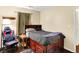 Bedroom featuring a bed with built-in storage and a gamer chair at 17401 Austrian Pine Way, Westfield, IN 46074