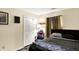 Bedroom with a wooden bed, closet, and gamer chair at 17401 Austrian Pine Way, Westfield, IN 46074